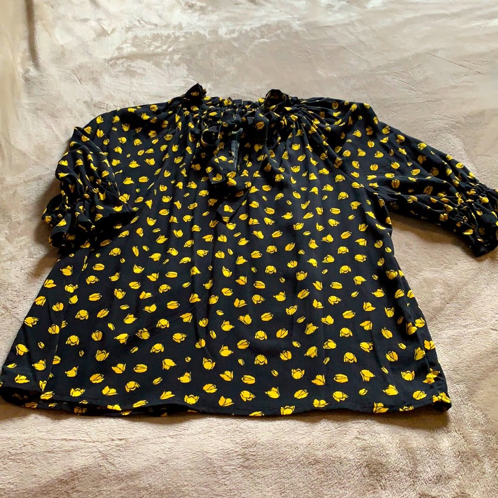 Woman’s Black w/ gold flower top. Size small